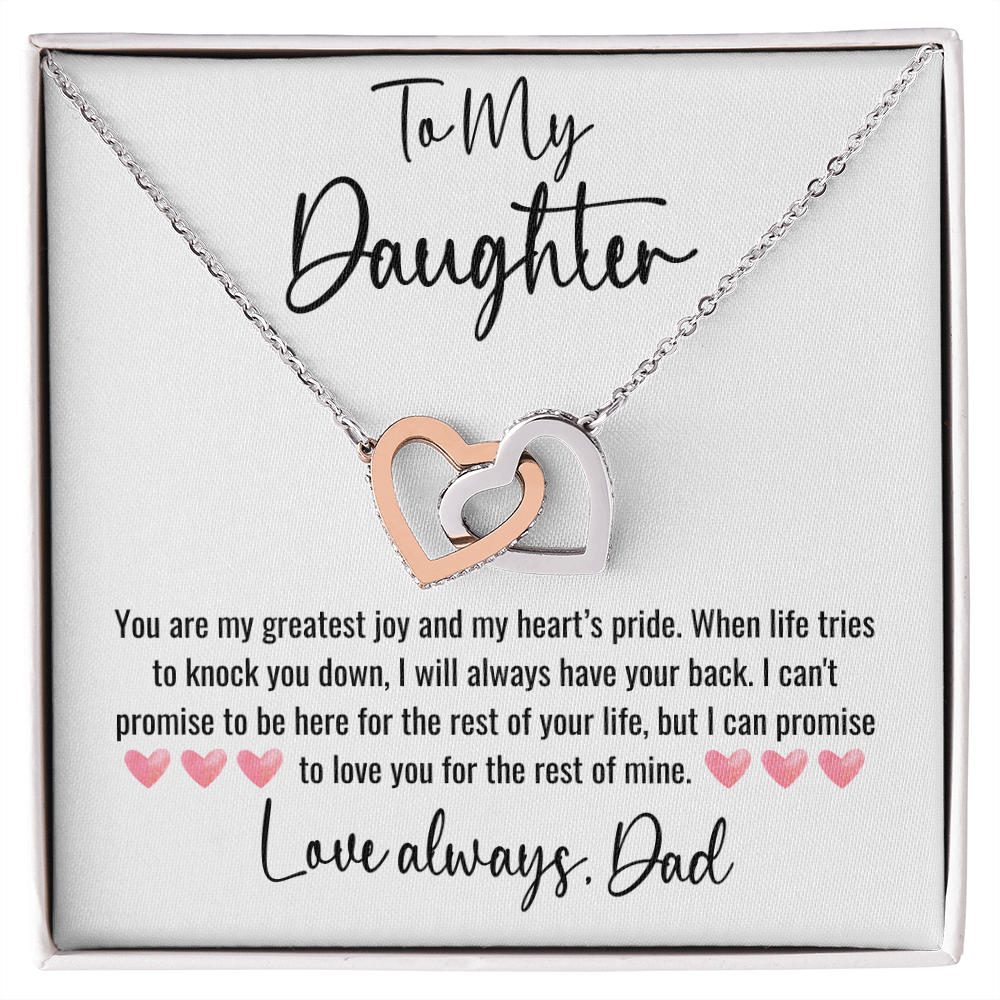 Close-up of the interlocking heart design on the Forever My Daughter Necklace, engraved 'With Love,' symbolizing the bond between a father and his daughter.